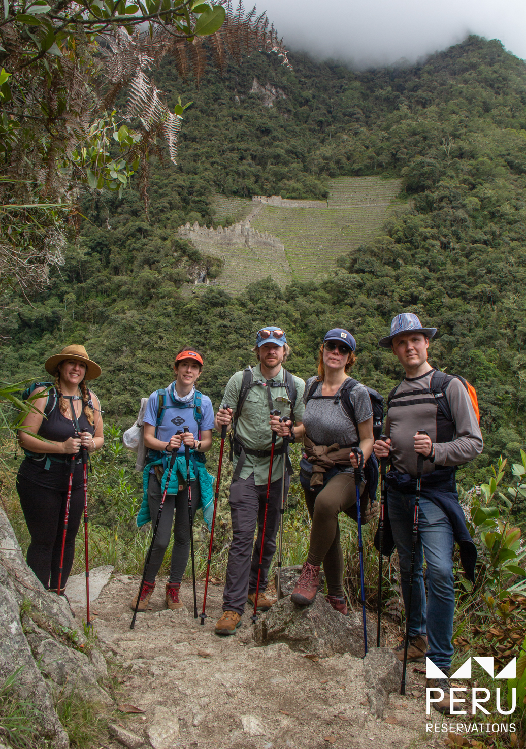 Hikers ascending through Kusichaca Valley