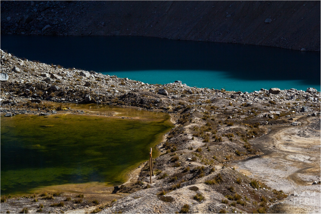 https://www.peru-reservations.com/wp-content/uploads/2025/10/lagos_de_montana_con_aguas_turquesa_y_verde-mountain_lakes_with_turquoise_and_green_waters.png