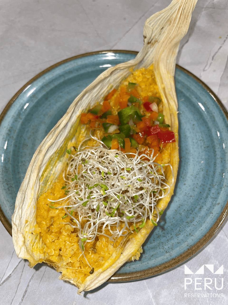 Quinoa with vegetables and sprouts in corn husk